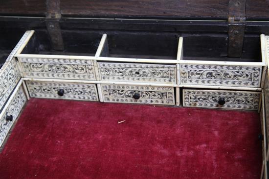 An 18th century Indo Portuguese ebony and ivory casket, width 1ft 7.5in. depth 1ft 1.5in. height 4.5in.